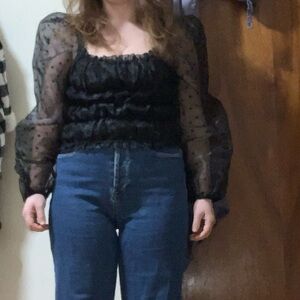 Hers & Mine L stretchy polka dot blouse with sinching and a puffy sleeve.